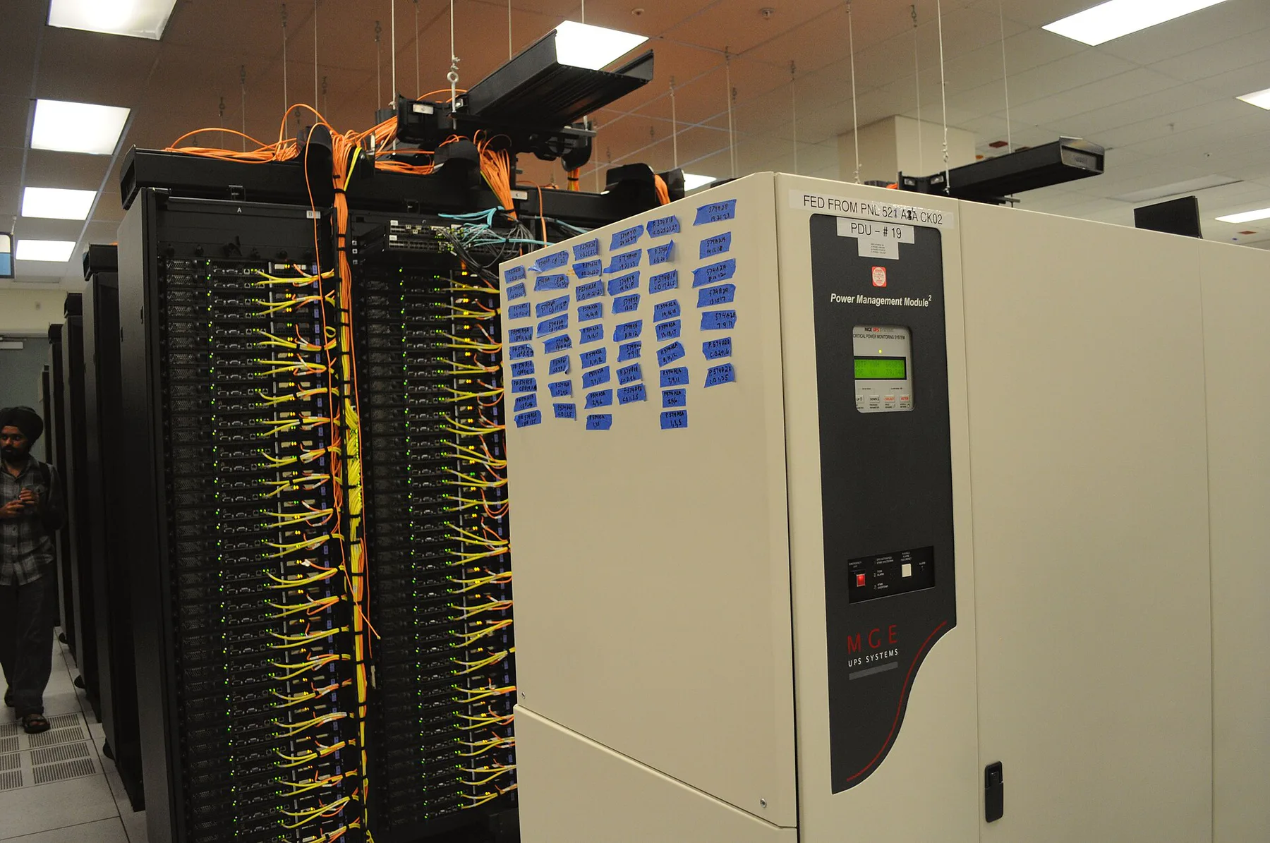 UPS power management module alongside data-centre infrastructure